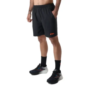 Short de pádel marca Tilki negro con logo naranja