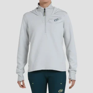 Vista frontal de la chaqueta de padel para mujer Bullpadel en color gris claro